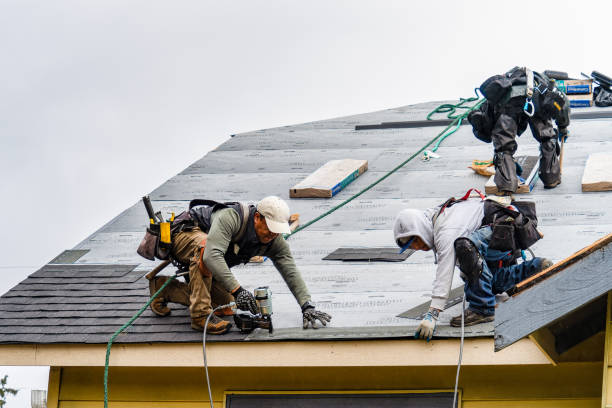 Professional Flat Roof Repair technician working in Stanwood, MI